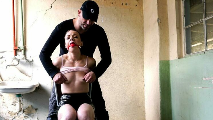 Brunette gets tied and machine fucked