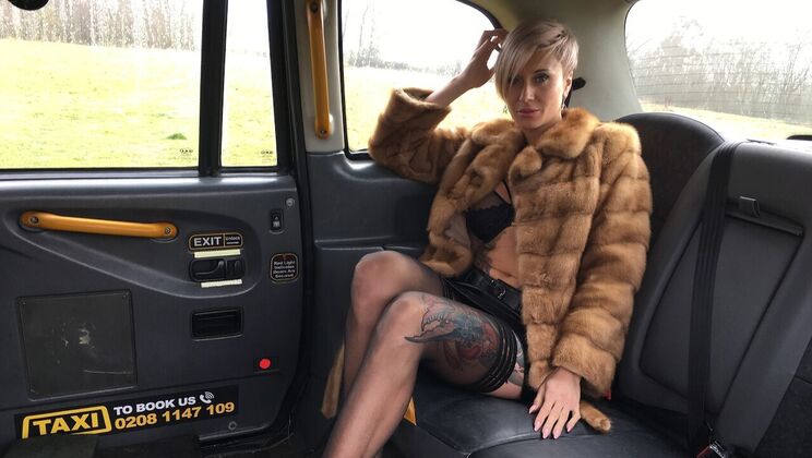 Tattooed and Pierced Blonde in Car Sex