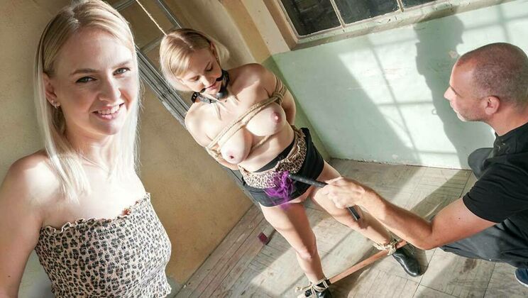 Shaved and blonde Kirsty in BDSM fun